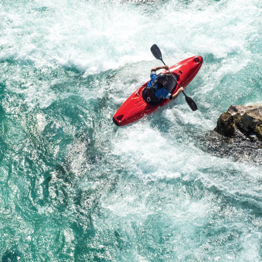 Mature Man Kayaking On  River Soca Rapids - High Angle View | VIACTIV Krankenkasse